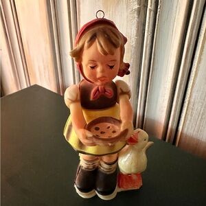 VINTAGE, KURT S ADLER, COLORFUL, PLASTIC HUMMEL LIKE CHRISTMAS ORNAMENT. 4 1/4”H